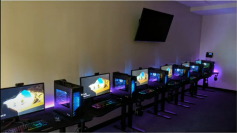 Computers lined up: Cases are RGB and have liquid cooled computers with processors that allow for the fastest possible experience when competing competitively. | AVIXA Computers lined up: Cases are RGB and have liquid cooled computers with processors that allow for the fastest possible experience when competing competitively. | AVIXA