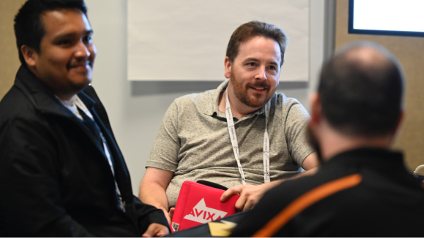 AV people talking with each other | AVIXA AV people talking with each other | AVIXA